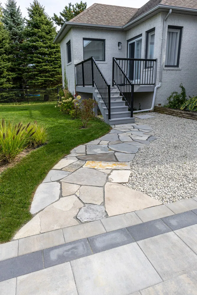 Flagstone walkway by Basque Landscaping